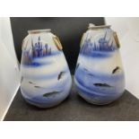 Japanese Ceramics: 19th cent. Fukagawa vases decorated with fish and reeds. 9ins.