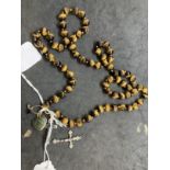 Jewellery: Necklet of (71) 10mm tiger's eye beads, length of necklet 34ins. Plus four pendants,