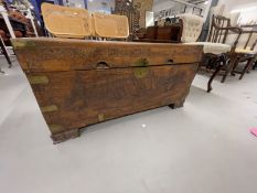 20th cent. Camphor wood marriage chest decorated with carved Oriental fishing boats. 37ins. x 17ins.