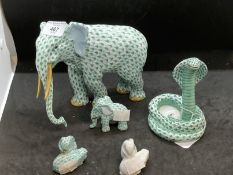 20th cent. Herend figures of animals including two elephants, hooded cobra and a group of two