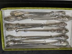 Objects of Virtu: Collection of 19th cent. Silver hallmarked and white metal button hooks. (12)