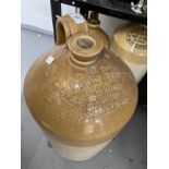 19th cent. Earthenware jugs the largest 20ins tall, William Irving Wine & Spirit Merchant Swindon,