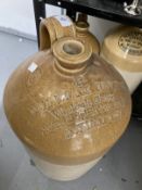 19th cent. Earthenware jugs the largest 20ins tall, William Irving Wine & Spirit Merchant Swindon,