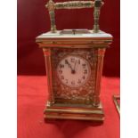 Clocks: 19th cent. Brass cased repeater striking on the halves and hour, carriage clock, circular