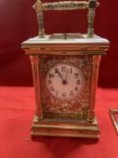 Clocks: 19th cent. Brass cased repeater striking on the halves and hour, carriage clock, circular