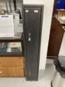 Sporting Equipment: Galvanised steel gun cabinet with two locks (3 keys). 53ins. x 9ins. x 5ins.