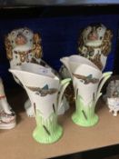 20th cent. Ceramics: Art Deco jugs decorated with bulrushes and flying ducks, a pair. Approx.