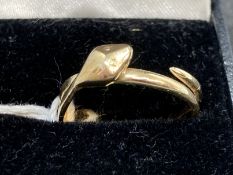 Jewellery: Yellow metal snake ring stamped 585, tests as 14ct gold. Ring size P. Weight 3.06g.