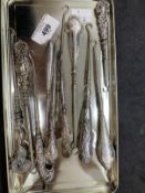 Objects of Virtu: Collection of 19th cent. Silver hallmarked and white metal button hooks. (12)