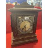 Early 20th cent. Oak cased 8 day bracket clock, brass spandrels and silver Roman numerals dial.