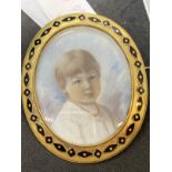 English School: c1900 miniature portrait of a girl, head and shoulders wearing a coral necklace,
