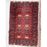 Carpets & Rugs: Early 20th cent. Indian carpet with multicoloured ground of reds, oranges, greys,