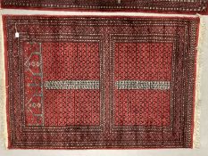 Carpets & Rugs: Early 20th cent. Turkman rug, unusual two rectangular central panels in blues,