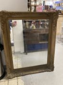 Late 19th cent. Gilt framed mirror, with repairs. 45ins. x 36ins.
