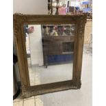 Late 19th cent. Gilt framed mirror, with repairs. 45ins. x 36ins.