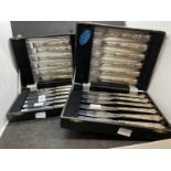 Hallmarked Silver: Two boxed sets of six fish knives and six forks.