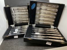 Hallmarked Silver: Two boxed sets of six fish knives and six forks.