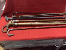 Walking Sticks/Canes: Includes a silver horse head handled stick, two silver topped canes, simulated