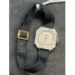 Watches: 18ct gold and platinum ladies diamond set by Mappin attached to a Moira band. Estimated