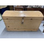 20th cent. Bow topped pine chest with candle box. 41ins. x 23ins. x 26ins.