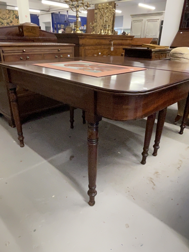 Regency mahogany D shaped dining tables on ring turned tapering legs, a pair. 29½ins. x 57ins. x