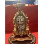 Clocks: 19th cent. French gilt mantle clock decorated with Sevres style panels on gilt base and