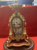 Clocks: 19th cent. French gilt mantle clock decorated with Sevres style panels on gilt base and