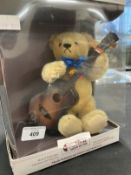 Toys/Collectibles: Steiff musical teddy bear with guitar and music box in its original box.