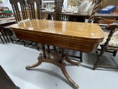 19th cent. Mahogany card table with boxwood inlay on four pillared supports with four splayed feet