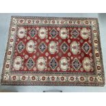 Carpets & Rugs: 20th cent. Caucasian carpet most likely Kazak, red ground, twenty-one large guls
