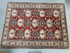 Carpets & Rugs: 20th cent. Caucasian carpet most likely Kazak, red ground, twenty-one large guls