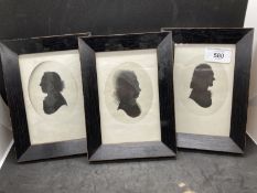 19th cent. English School: Silhouettes, one of a lady and two of men, on reverse 'These three