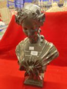 20th cent. Spelter bust of a young lady on a square base. 18ins.