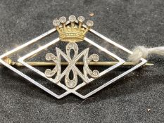 Jewellery: Yellow and white metal brooch open lozenge shape with a five pointed crown above cypher