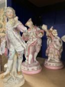 Ceramics: Porcelain figures, young lady and gentleman holding fans, small loss to his fan, on