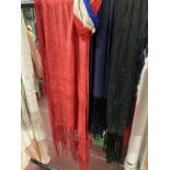 Ismay Archive: Fashion: Silk evening shawls, one bright red with deep lacework fringe, one black