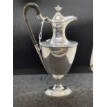 Hallmarked Silver: Hot water jug by Walter & Hall hallmarked Sheffield. Weight 16.9oz.