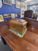 19th cent. Rosewood sarcophagus tea box with fitted interior and lion's head handles.