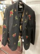 Fashion: Evening jackets Kaleidoscope black jacket embroidered with red flowers. Life Style jacket