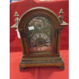 Clocks & Watches: Early 20th cent. German oak cased mantel clock with gilt and white face, applied