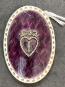 Jewellery: Gilt and enamelled oval buckle, purple with a white border and a lover's heart at the