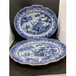 Late 18th cent. Chinese blue and white shaped meat plates decorated with figures in a landscape with
