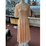 Ismay Archive: Early 20th cent. Fashion: Night wear, peach silk ballet length nightgown, lace