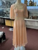 Ismay Archive: Early 20th cent. Fashion: Night wear, peach silk ballet length nightgown, lace