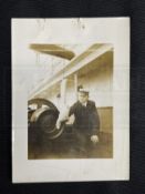 R.M.S. TITANIC: A rare photograph of Titanic's Purser Hugh Walter McElroy shown holding a parrot.