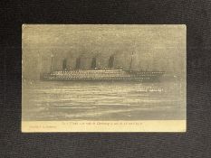 R.M.S. TITANIC: Rare French postcard showing her at night in Cherbourg, all lights on, with pink