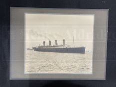 R.M.S. OLYMPIC: Period silver gelatin photograph of Olympic on April 10th 1912 leaving on her maiden