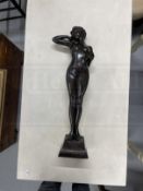 20th cent. Art Deco style bronze figure, waking female on a square base engraved to the reverse