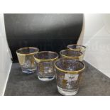 Glass: Italian tumblers decorated with scrolls and flowers in real gold. Made in Italy label and