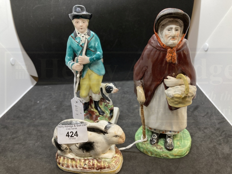 19th cent. Staffordshire figures c1830 a rabbit 4ins, a hunter carrying a gun standing before a